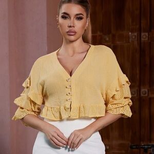 Yellow elbow-length ruffle top